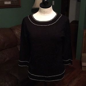 Black sweater with white trim work